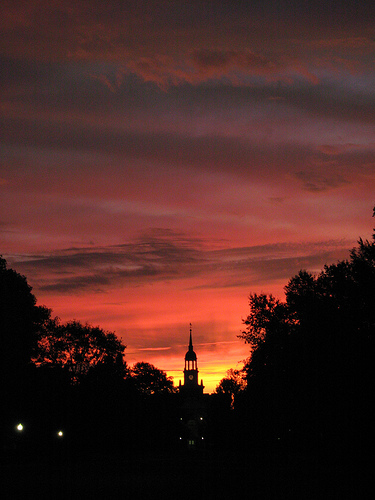 campus photo at dusk with red sunset